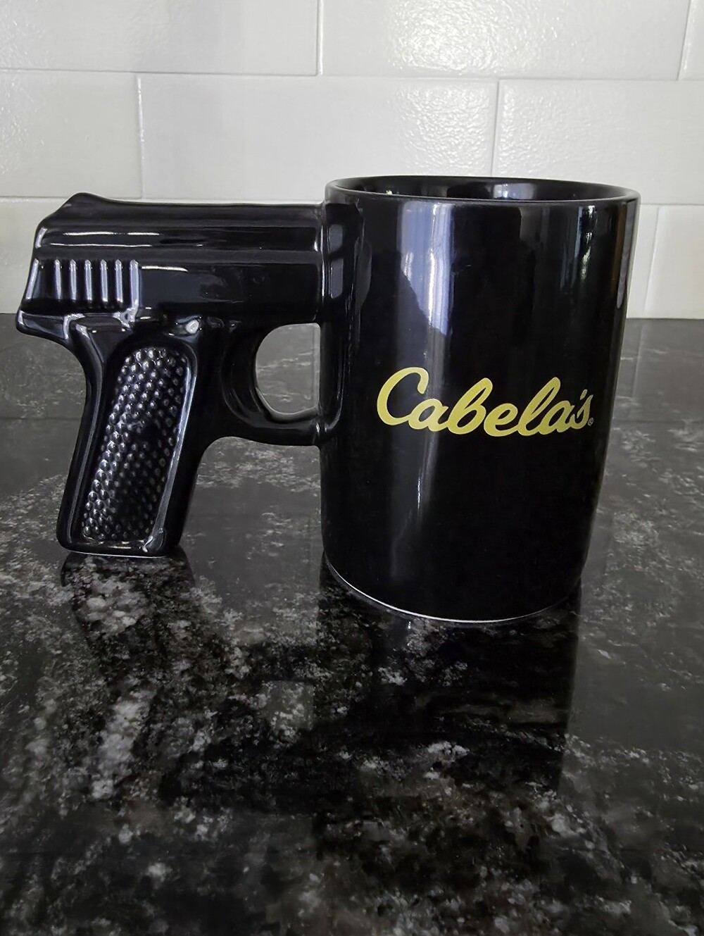 Cabela's Black Ceramic Coffee Mug Pistol Grip Handgun Handle Gold Logo Novelty